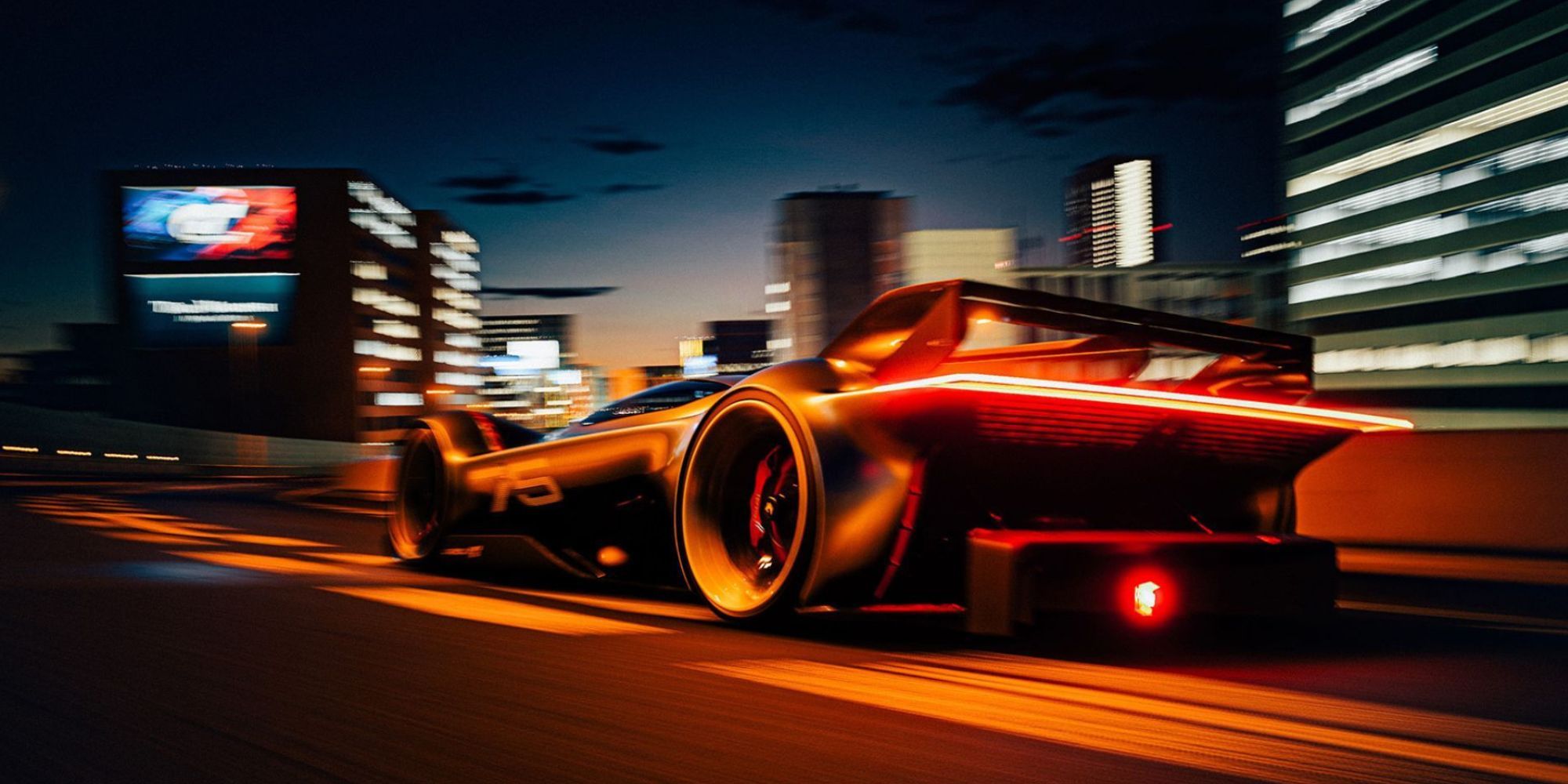 The Ferrari Vision at night racing through a city in gran turismo 7.