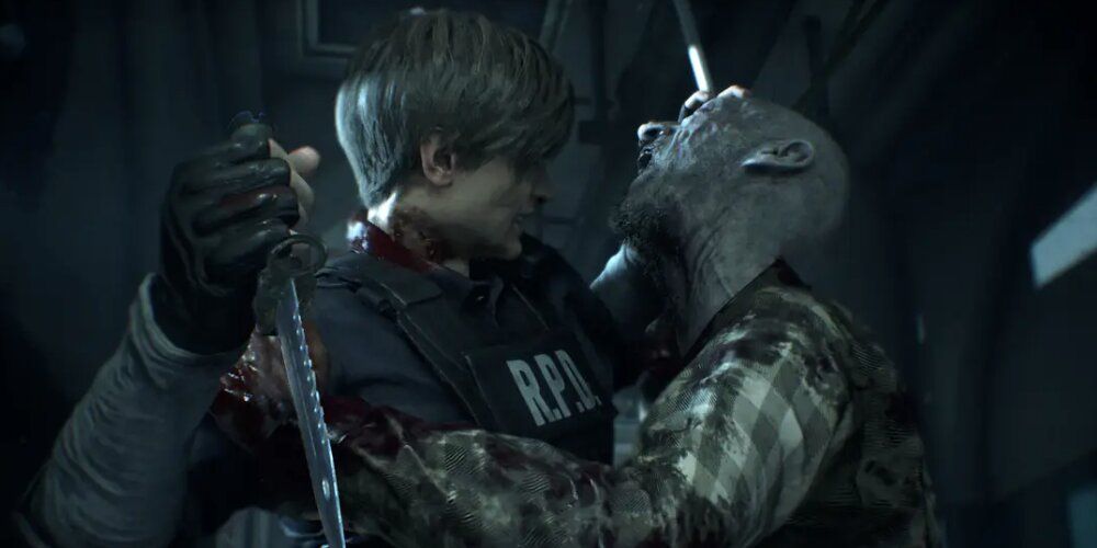 Leon striking a zombie with a knife in Resident Evil 2 Remake