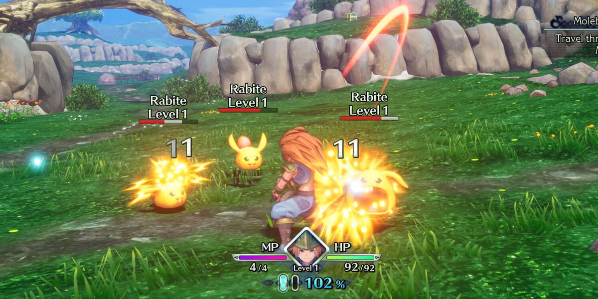 Trials Of Mana protagonist fighting rabite enemies.