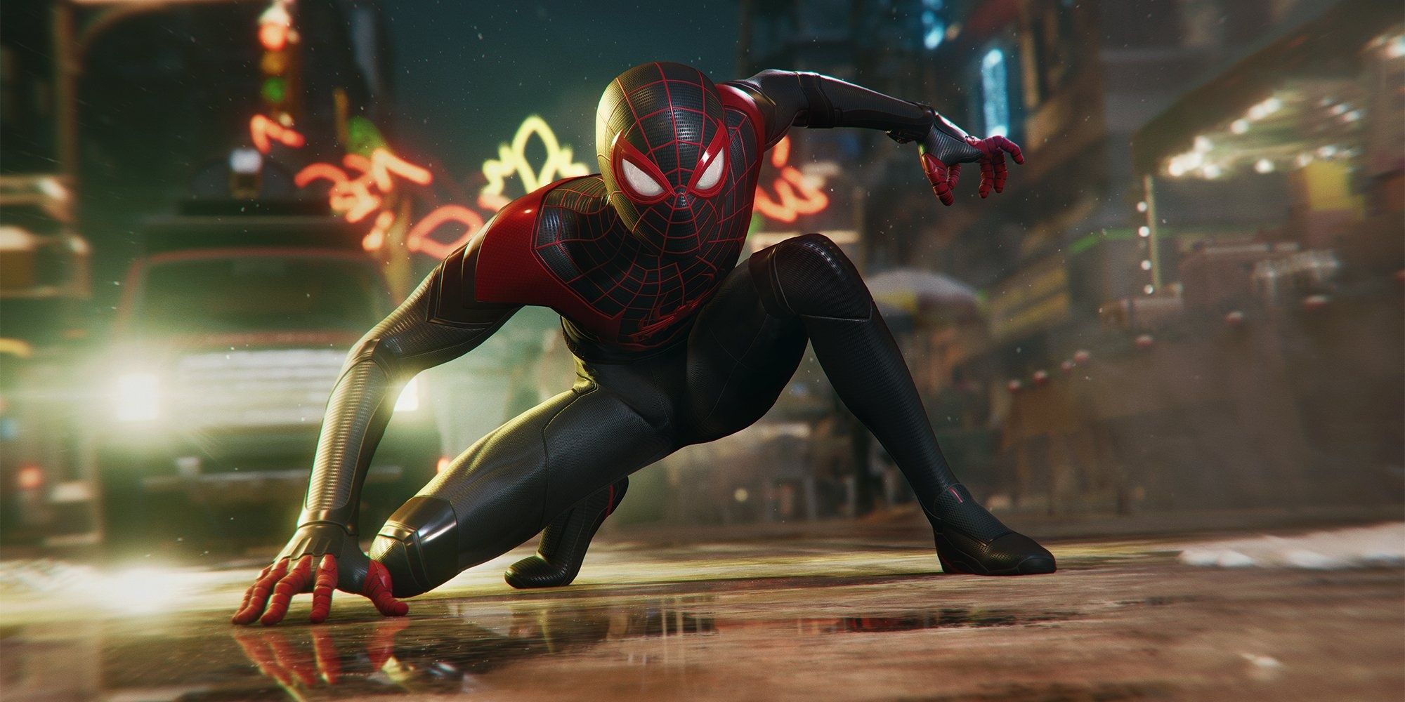 A screenshot showing Miles Morale in Marvel's Spider-Man: Miles Morales, crouching in the middle of the street.