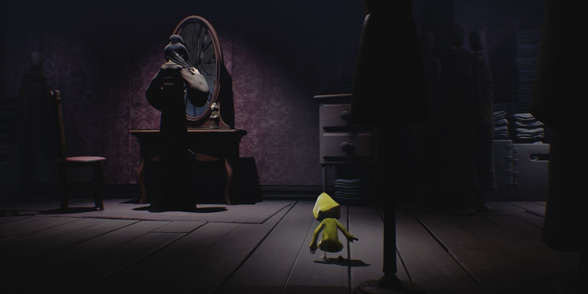 The Lady brushing her hair in front of a broken mirror as Six looks on in Little Nightmares