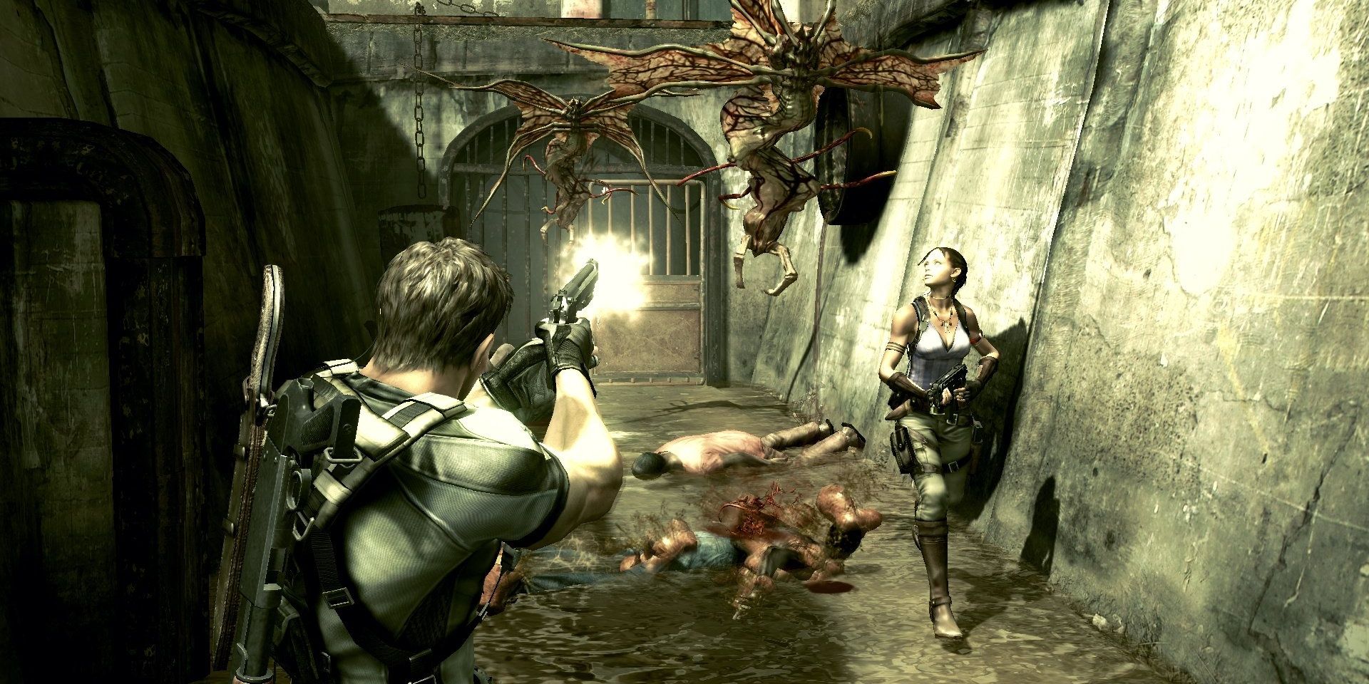 A screenshot showing Chris and Sheeva shooting flying Kipepeo infected creatures in Resident Evil 5.