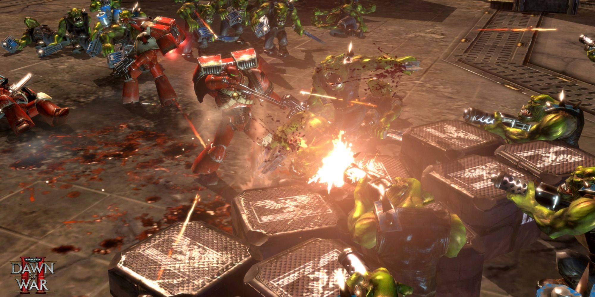 Space Marines fighting Orks in Warhammer 40,000 Dawn of War 2.