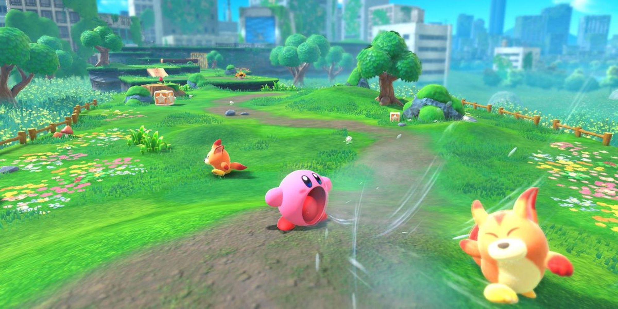 Kirby inhaling a fox enemy in Kirby and the Forgotten Land.