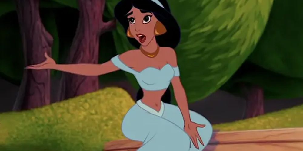 Jasmine sitting in her teal outfit as she argue withs her father, who is off-screen.