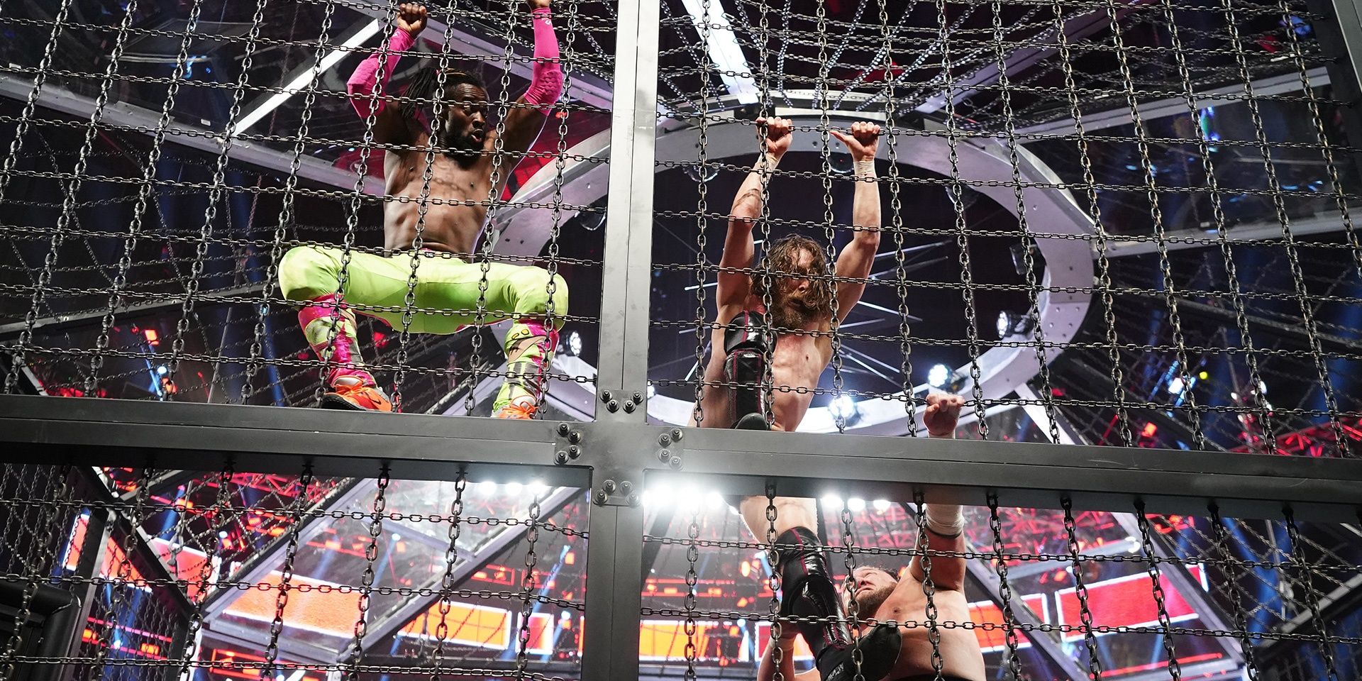 Kofi Kingston, Daniel Bryan & Samoa Joe climbing the Chamber wall