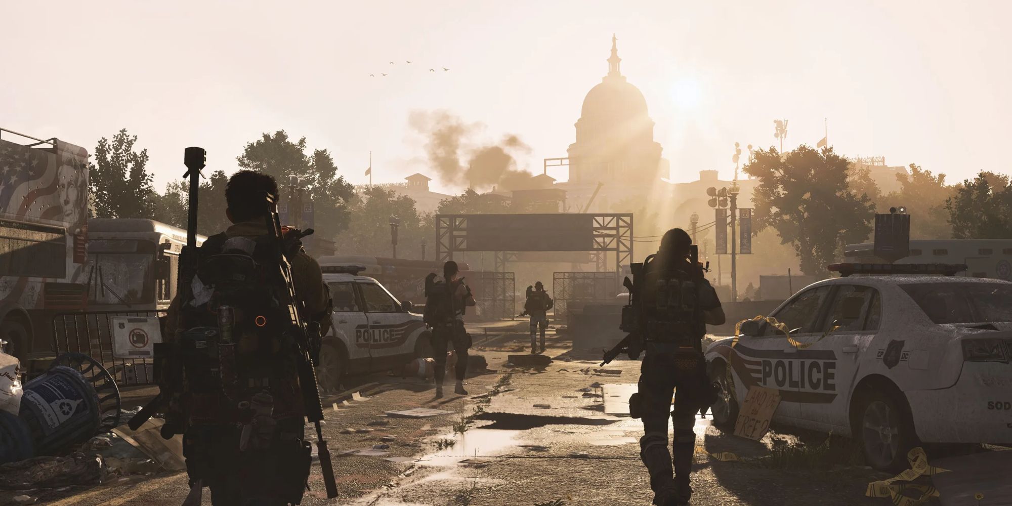 Squad walking up to the Capitol building in DC in The Division 2, with the sun glaring in the distance.