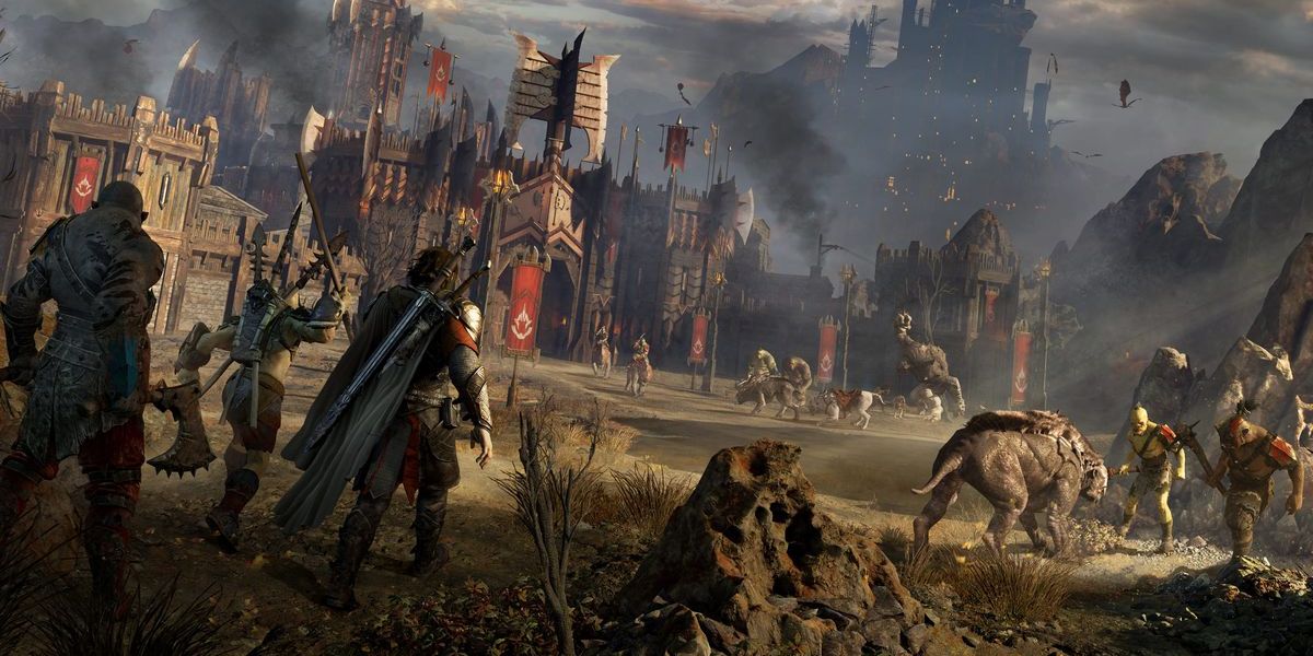 Middle-Earth Shadow Of War screenshot of protagonist standing with allies, while staring at some enemies in the distance.