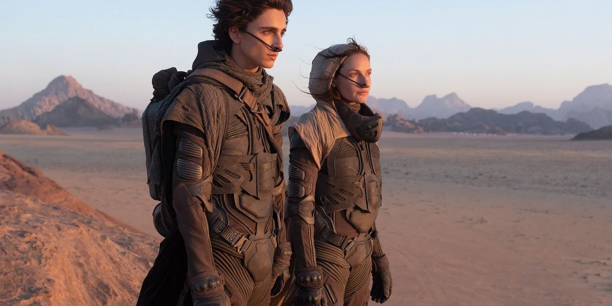 Dune 2021 - Paul And His Mother In Their Stillsuits On Arrakis.