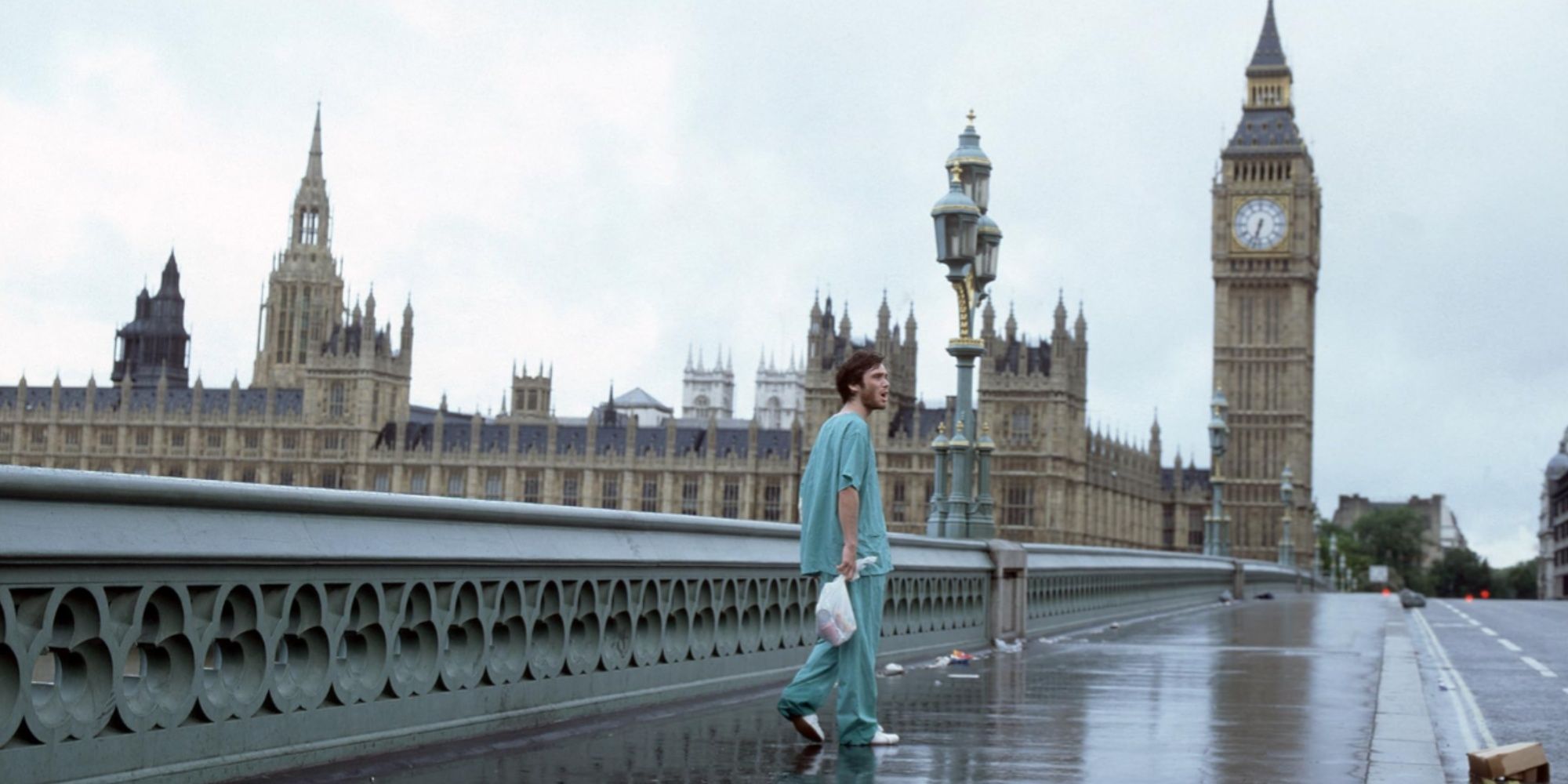 Cillian Murphy as hospital patient Jim in scrubs, wandering the empty streets of an apocalyptic London.