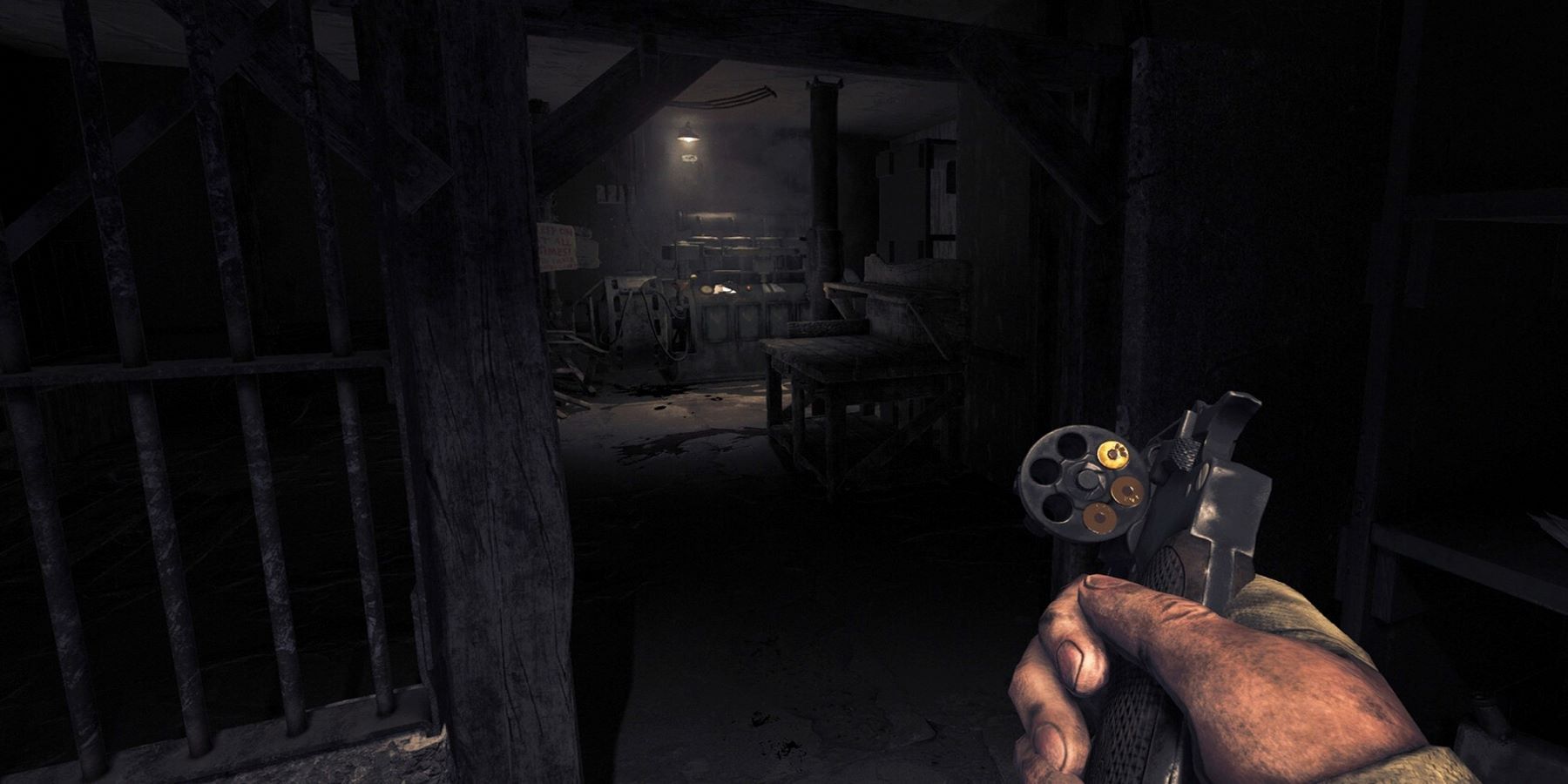 Henri Clement looking at the bullets in his revolver in Amnesia: The Bunker