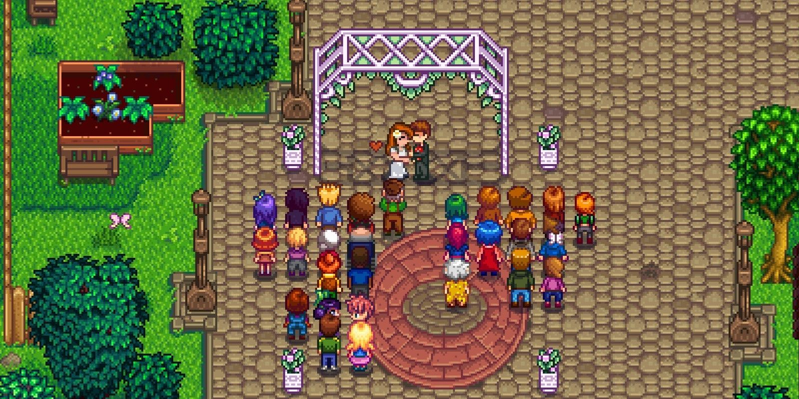 Two characters getting married in a ceremony in Stardew Valley.