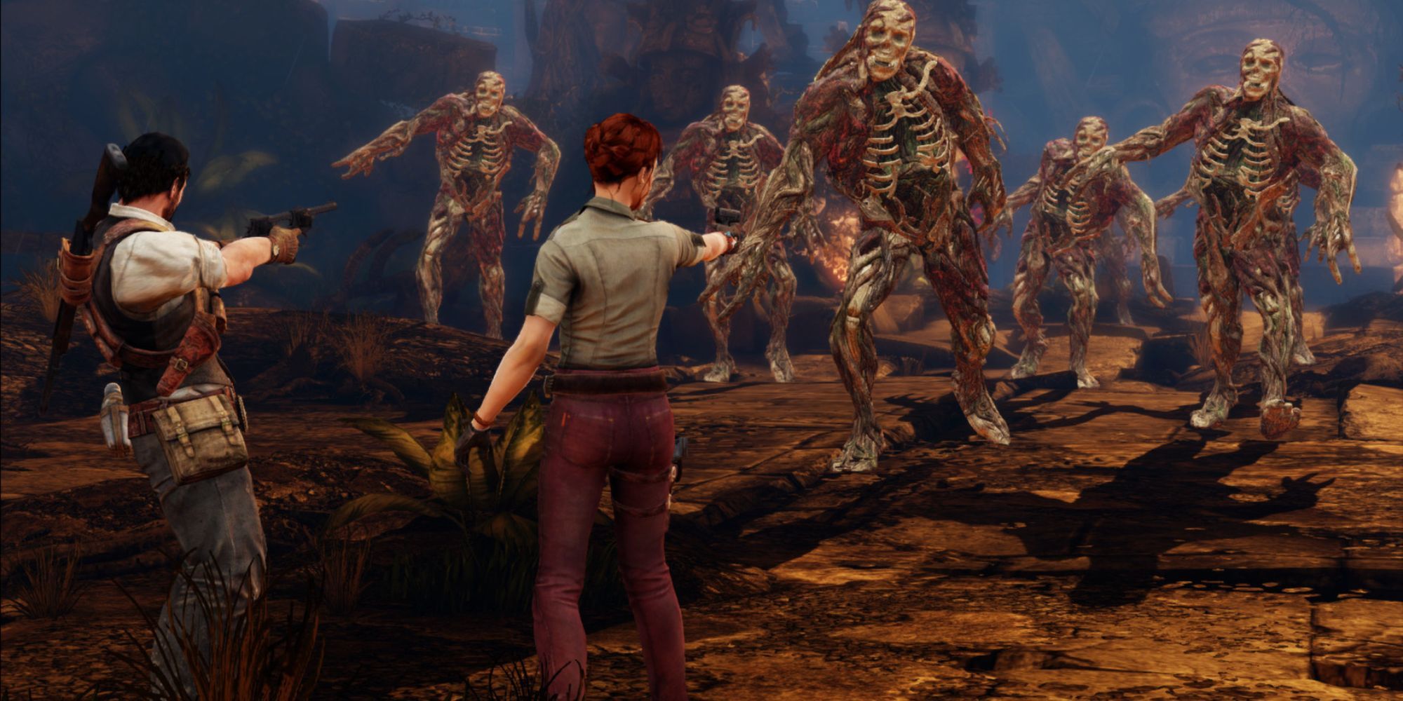 James and Jennifer attack a group of skeleton enemies.