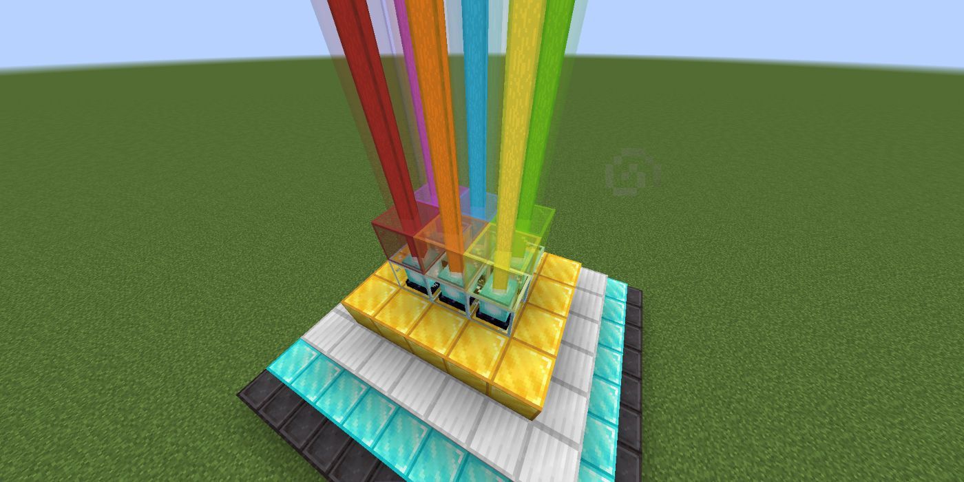 A large beacon in Minecraft with each beam as a different color, which is done with stained glass. 