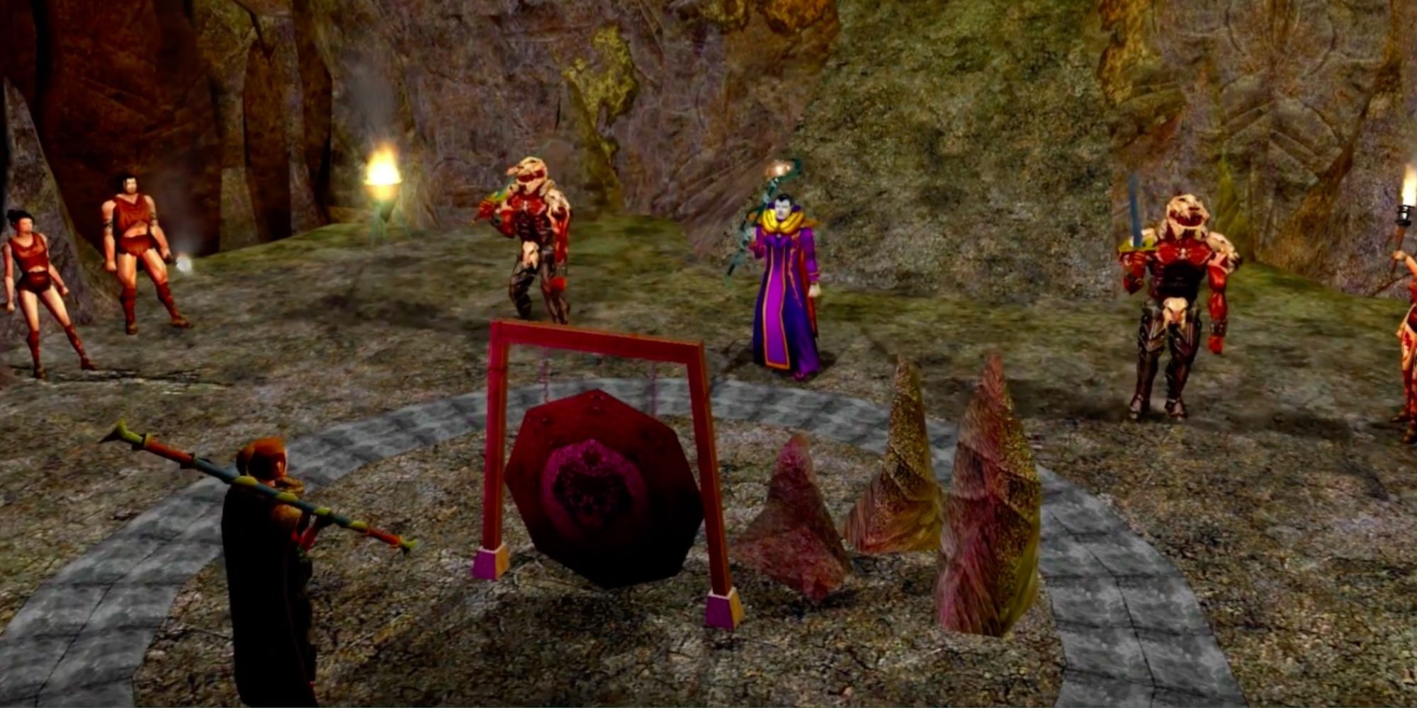 Neverwinter characters gathered around rocks and a gong