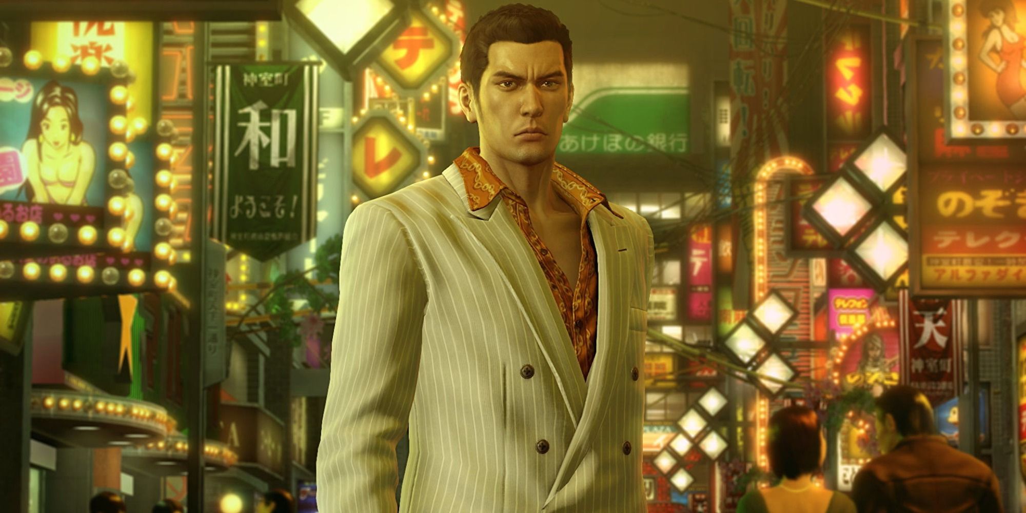 Kiryu standing in the middle of a busy street in Yakuza 0, looking into camera.