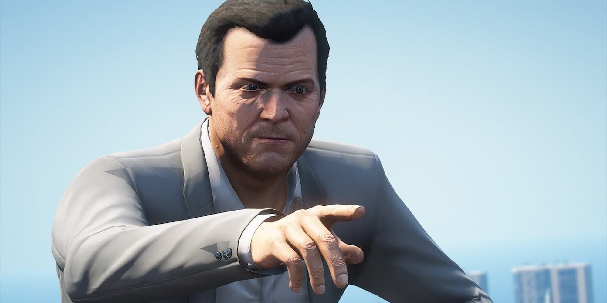 Grand Theft Auto 5 close up of Michael pointing at something off-screen.