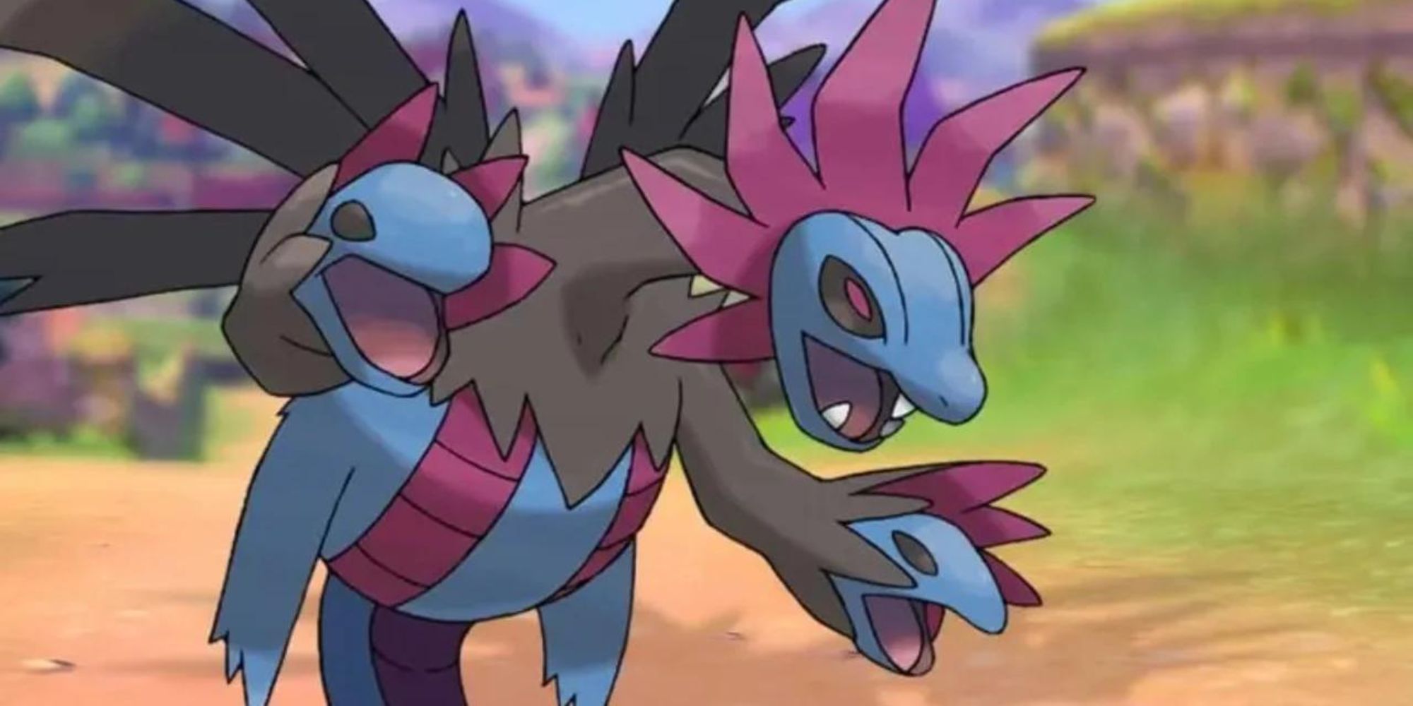 Hydreigon roaring in a field in Pokemon Scarlet & Violet.