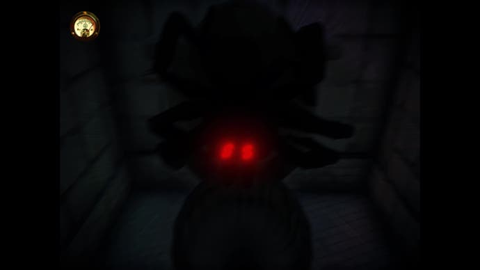 A spider with glowing red eyes prepares to attack the player in Fullbright Presents: Toilet Spiders.