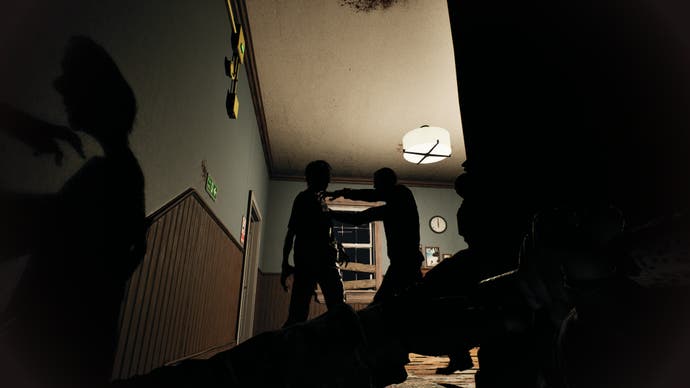 A screenshot of No More Room In Hell 2, showing a trio of zombies silhouetted at the top of a flight of stairs.