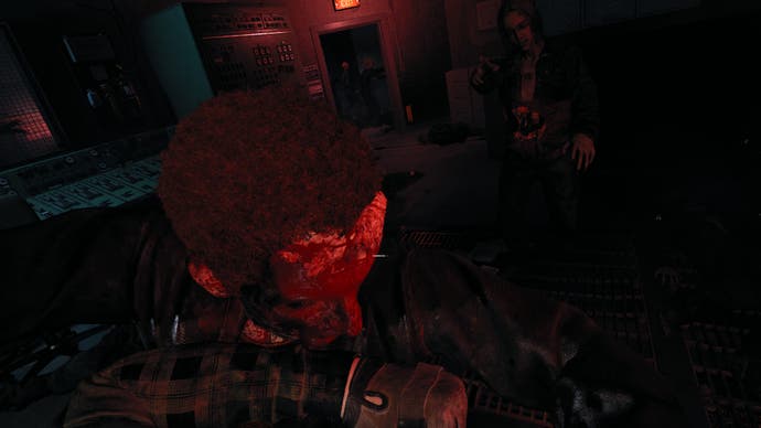 A screenshot of No More Room In Hell 2, showing the player being mauled by a zombie from a first-person perspective.