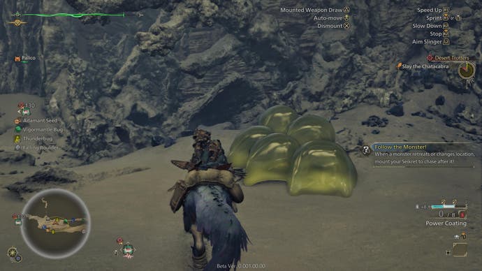 Monster Hunter Wilds beta screenshot showing player character riding towards golden blobs in rocky region