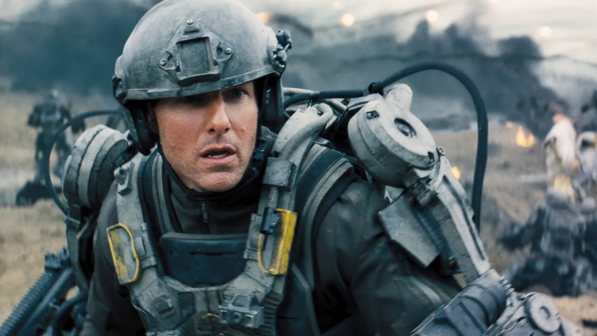 Tom Cruise as Major William Cage on the battlefield during Edge of Tomorrow, one of the best Netflix sci-movies out right now.