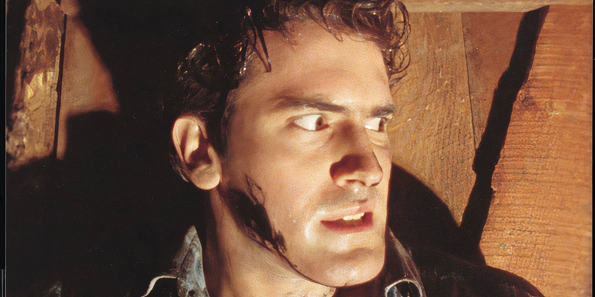 10 Most Iconic Horror Movie Actors Bruce Campbell playing Ash in Evil Dead