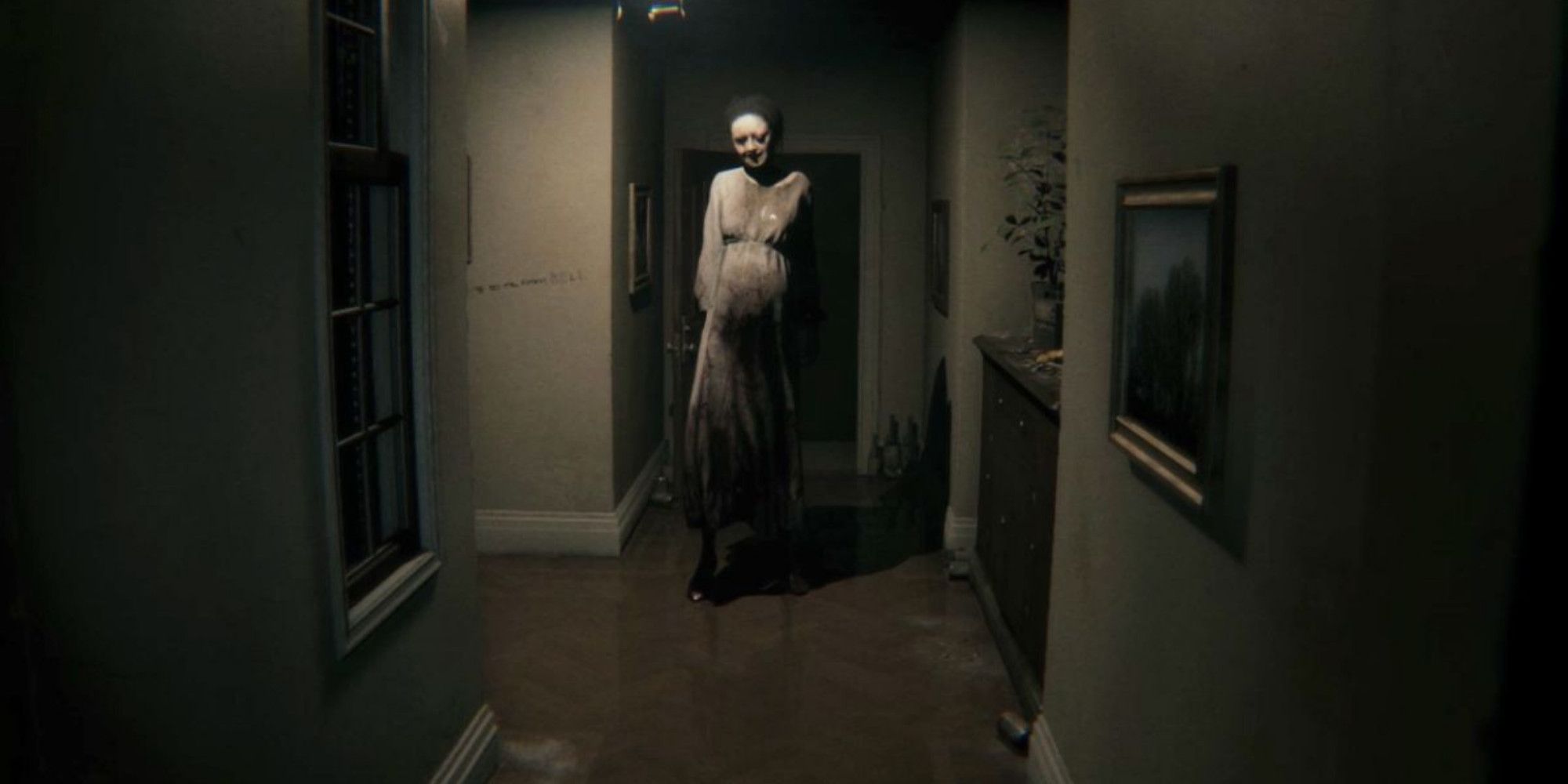 Eerie paranormal woman walking through a corridor in a suburban home in PT teaser for Silent Hills