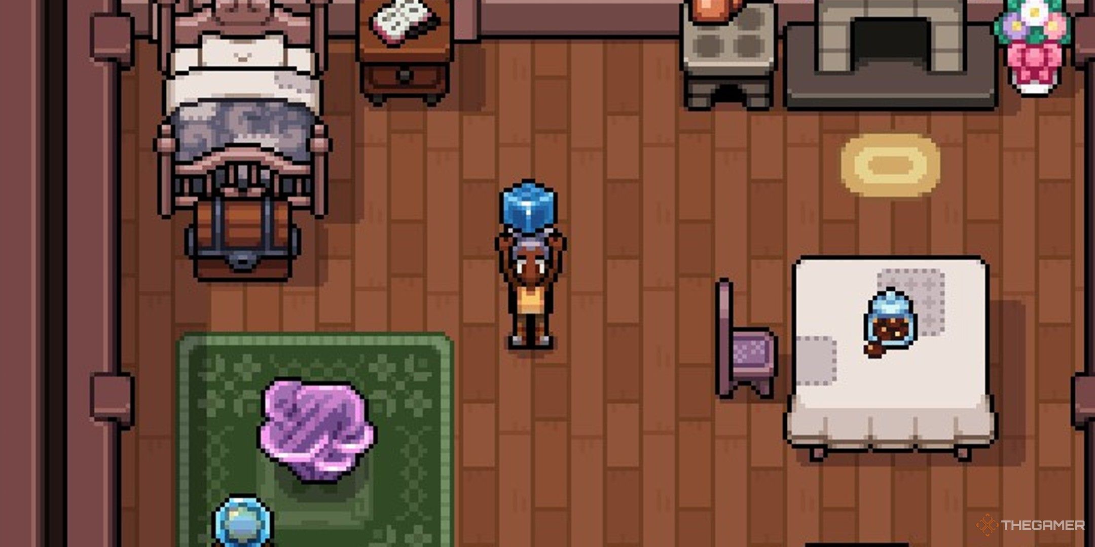 Player character holding a Tidestone up in their home in Fields of Mistria. 