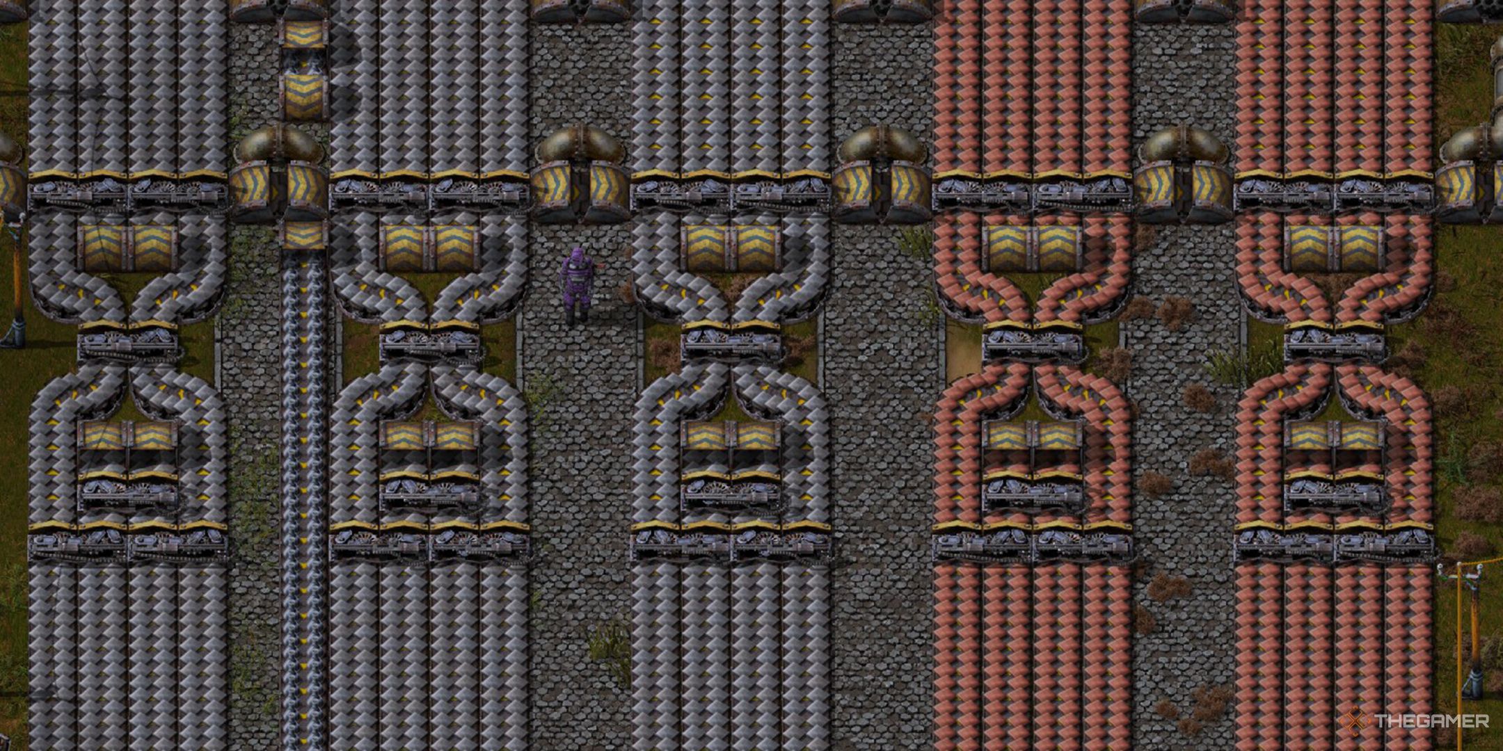 The player standing next to several rows of balanced Belt lines, transporting iron and copper.