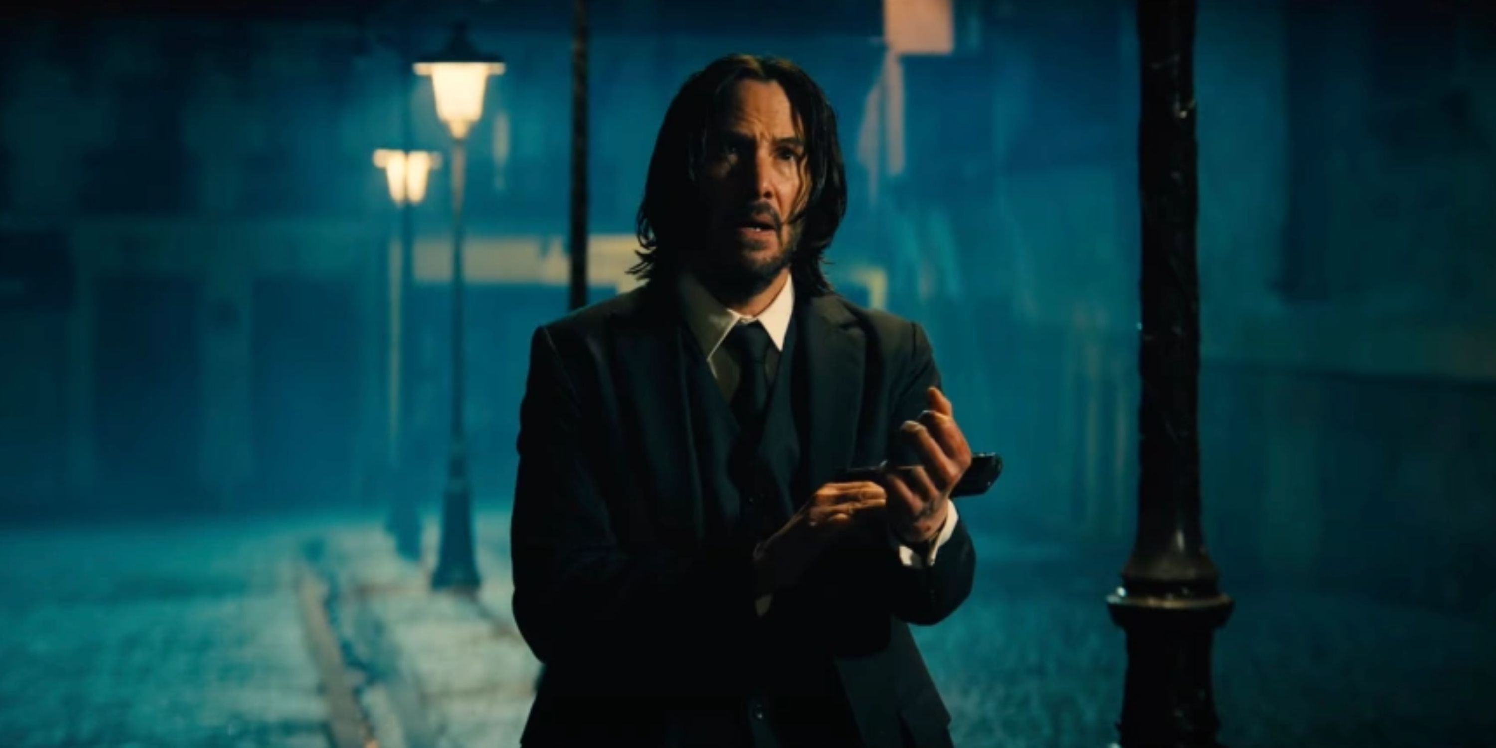 john wick checking his watch