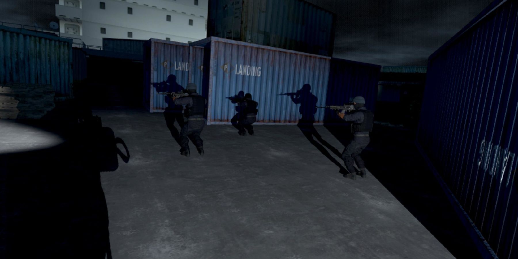 Onward gameplay players ready for action in dark ship warehouse yard