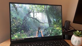 Close up on MSI Raider 18 HX display running Shadow of the Tomb Raider benchmark in 4K