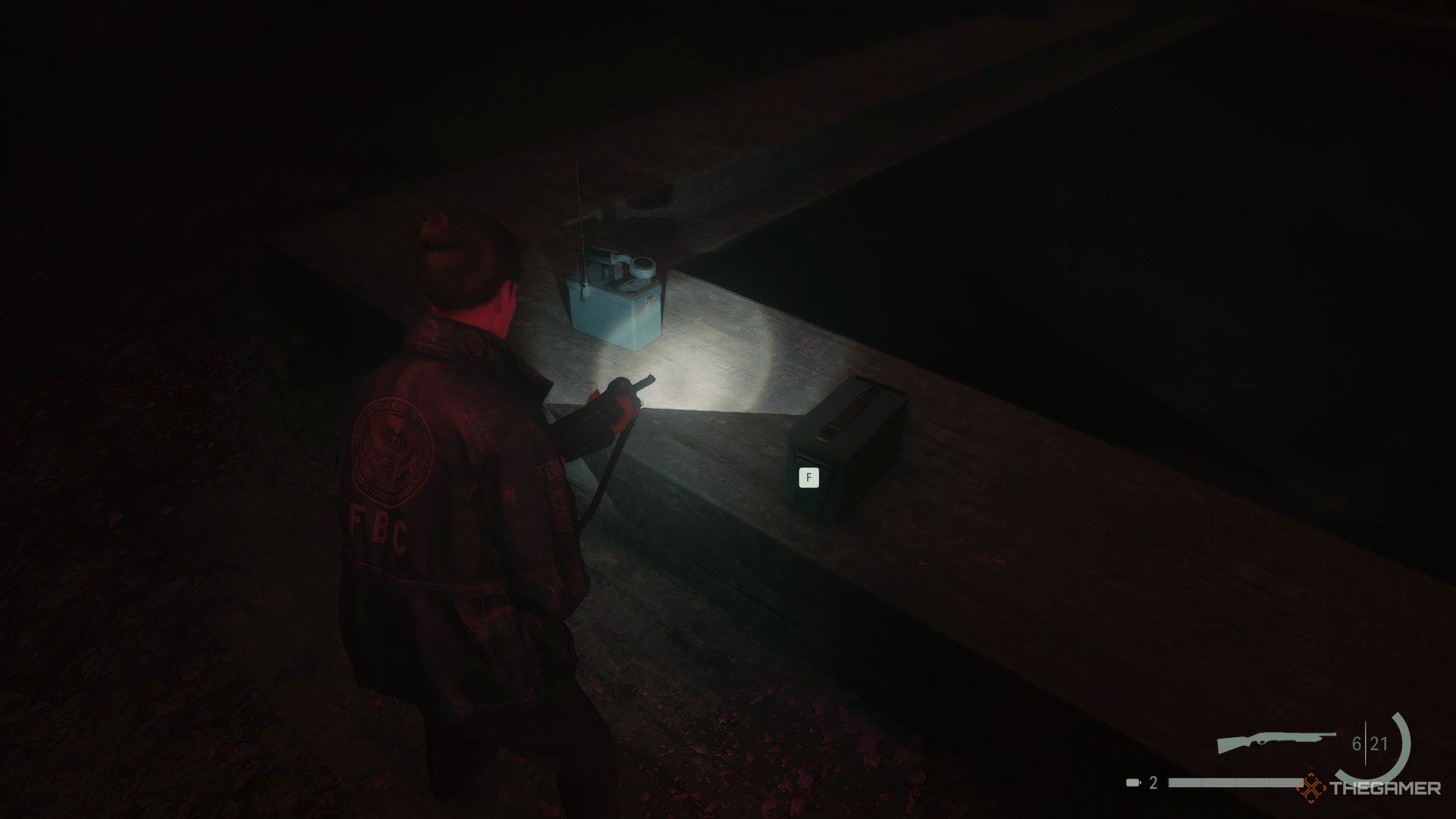 The player finding the ammo for Shotgun in the boss arena of Dr. Marmont.