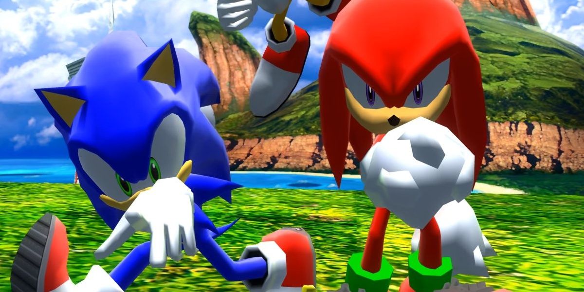 Sonic running with his hand out and Knuckles forming a fist toward the screen in Sonic Heroes.