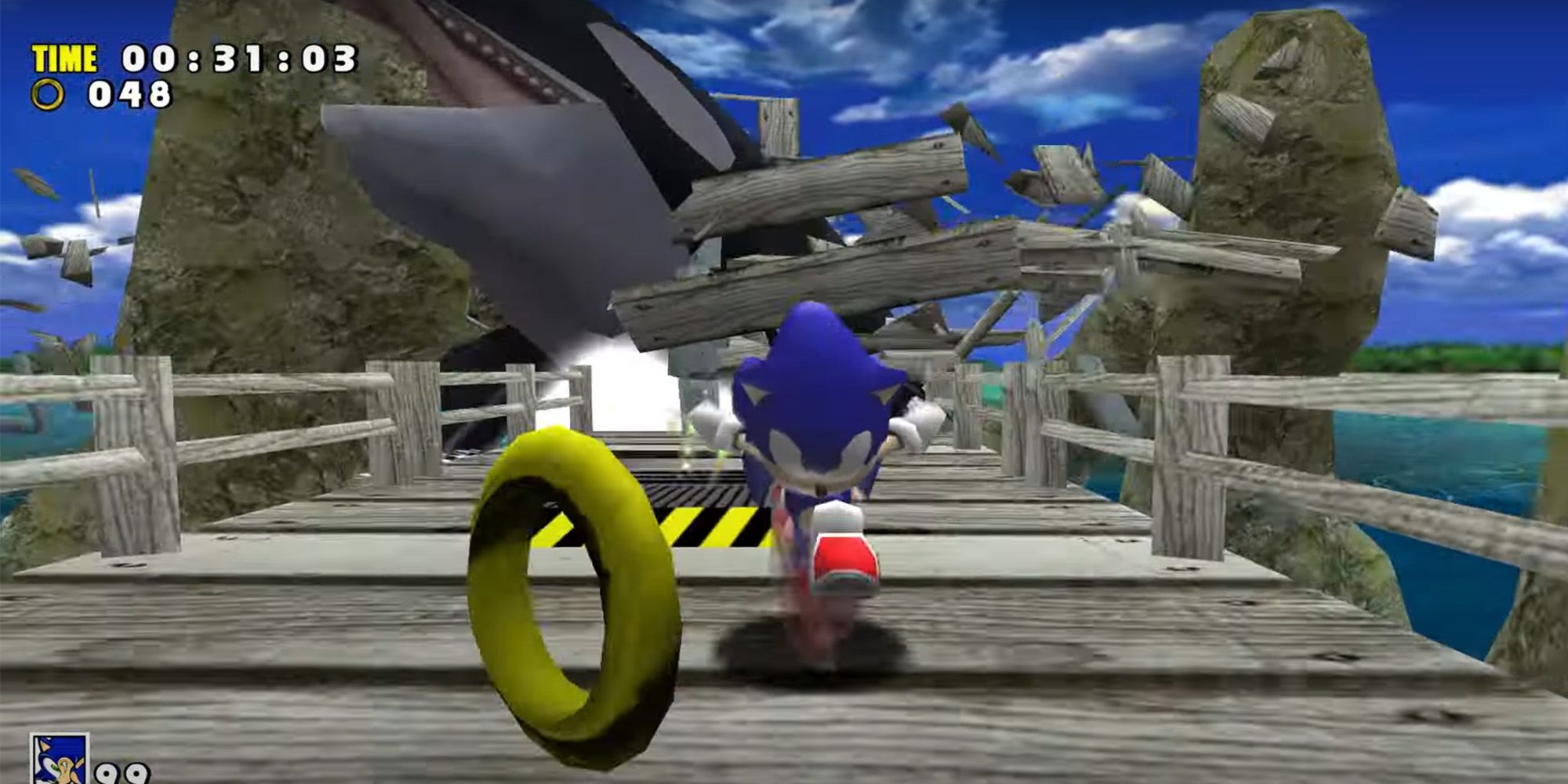 Sonic Adventure: Sonic running away from a whale in Emerald Coast.