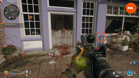 An orange circle highlights the location of the water valve, next to the flower shop door, in the Black Ops 6 Zombies Liberty Falls main quest.