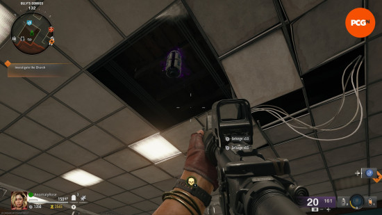 A purple glowing component floats in the ceiling of Olly's Comics in the Black Ops 6 Zombies Liberty Falls main quest.