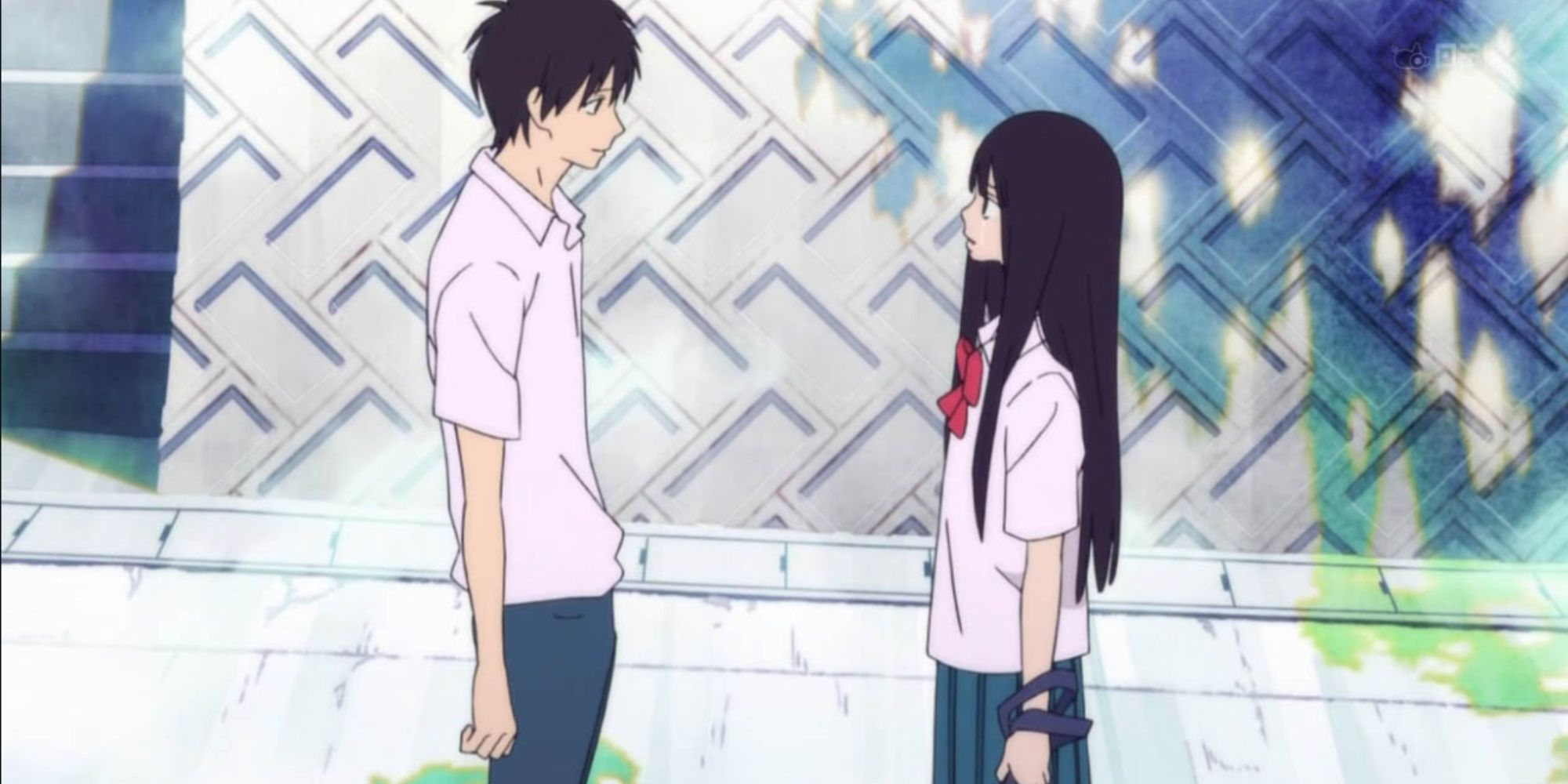 Sawako and Kazehaya look at each other outside