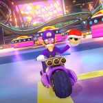 A screenshot of Waluigi racing on Waluigi Pinball in Mario Kart 8 Deluxe's Booster Course Pass.