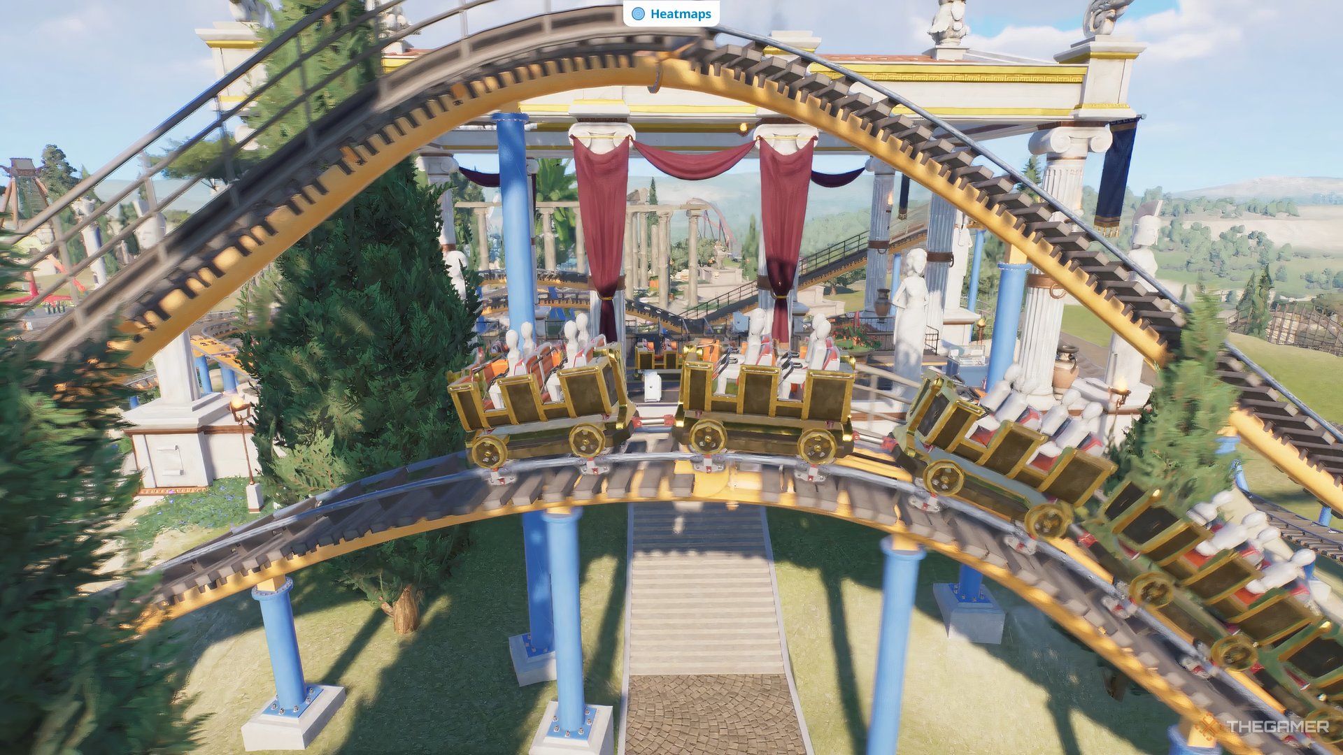 Dummies testing a mythological coaster with mythology decor in the background.