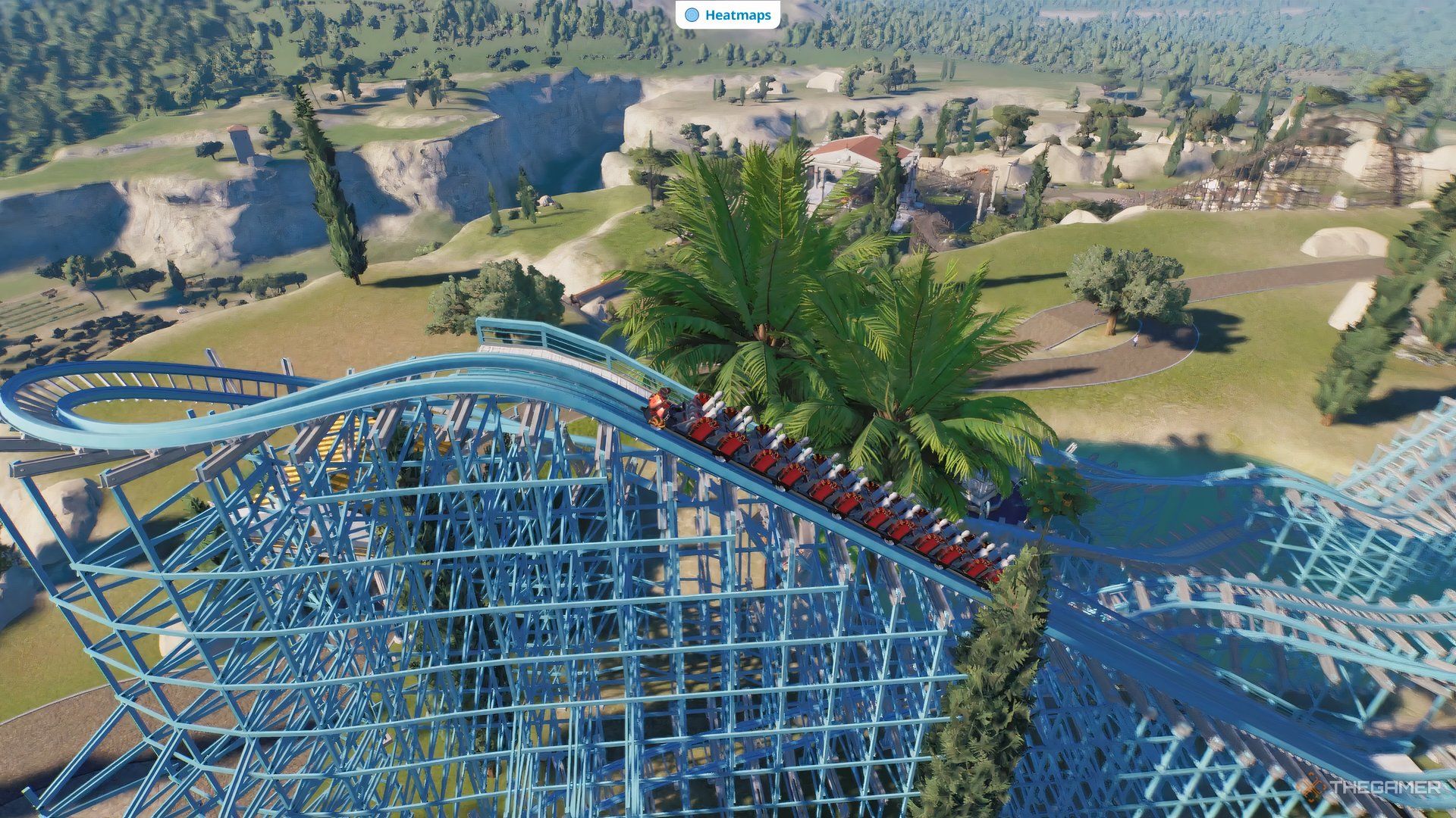 Dummies testing a mythology themed coaster on a hill.