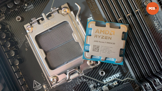 AMD Ryzen 7 9800X3D review: Gaming CPU next to AM5 motherboard socket.