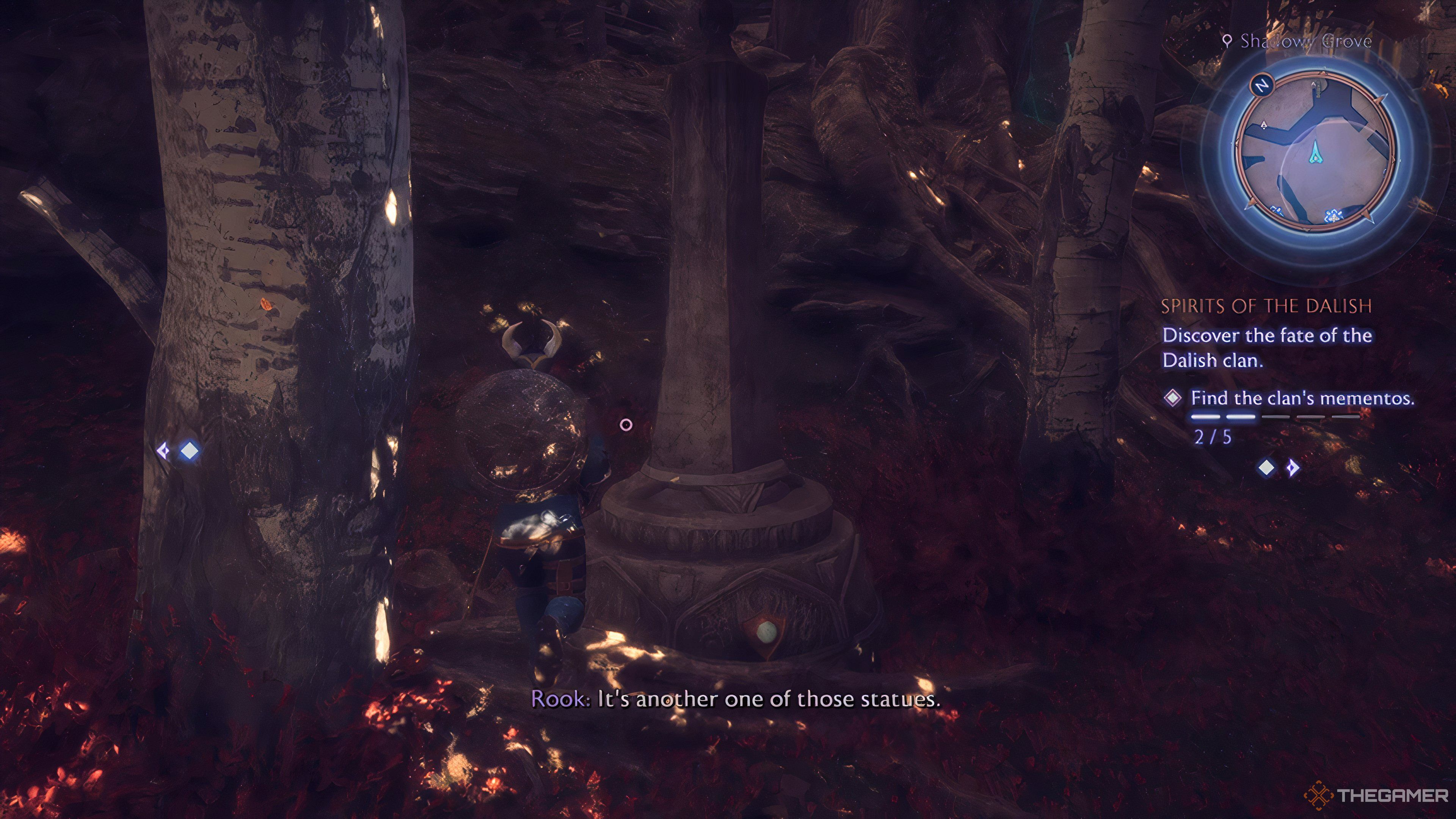 A statue between two trees in Dragon Age: The Veilguard.