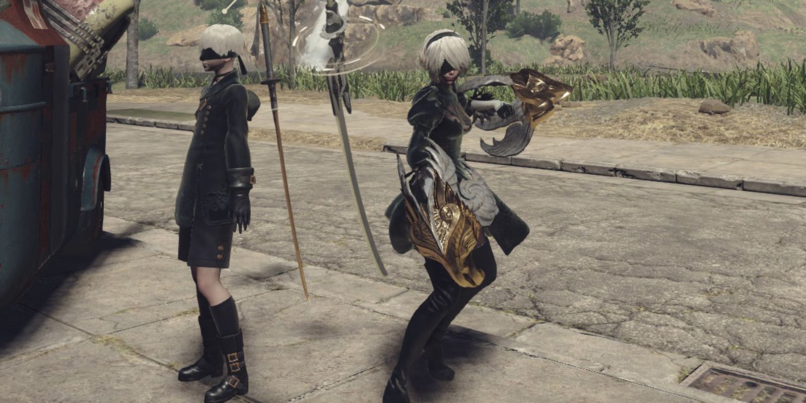 9S and 2B standing next to Emil's traveling shop in Nier Automata.