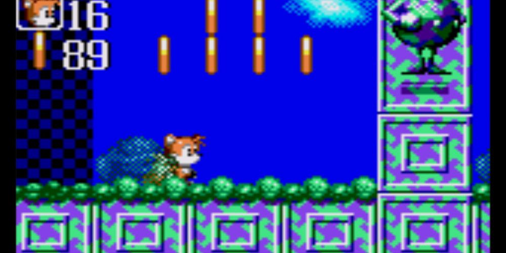 A screenshot of Sonic Chaos on the Game Gear featuring Tails in a 2D environment.