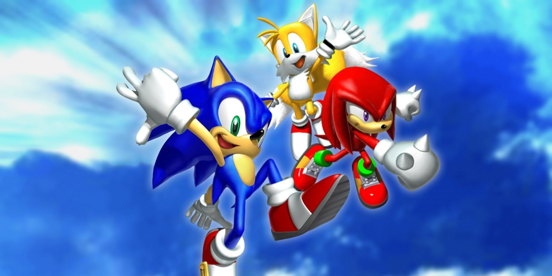 Sonic, Tails and Knuckles all jumping in the air in promo art for Sonic Heroes.