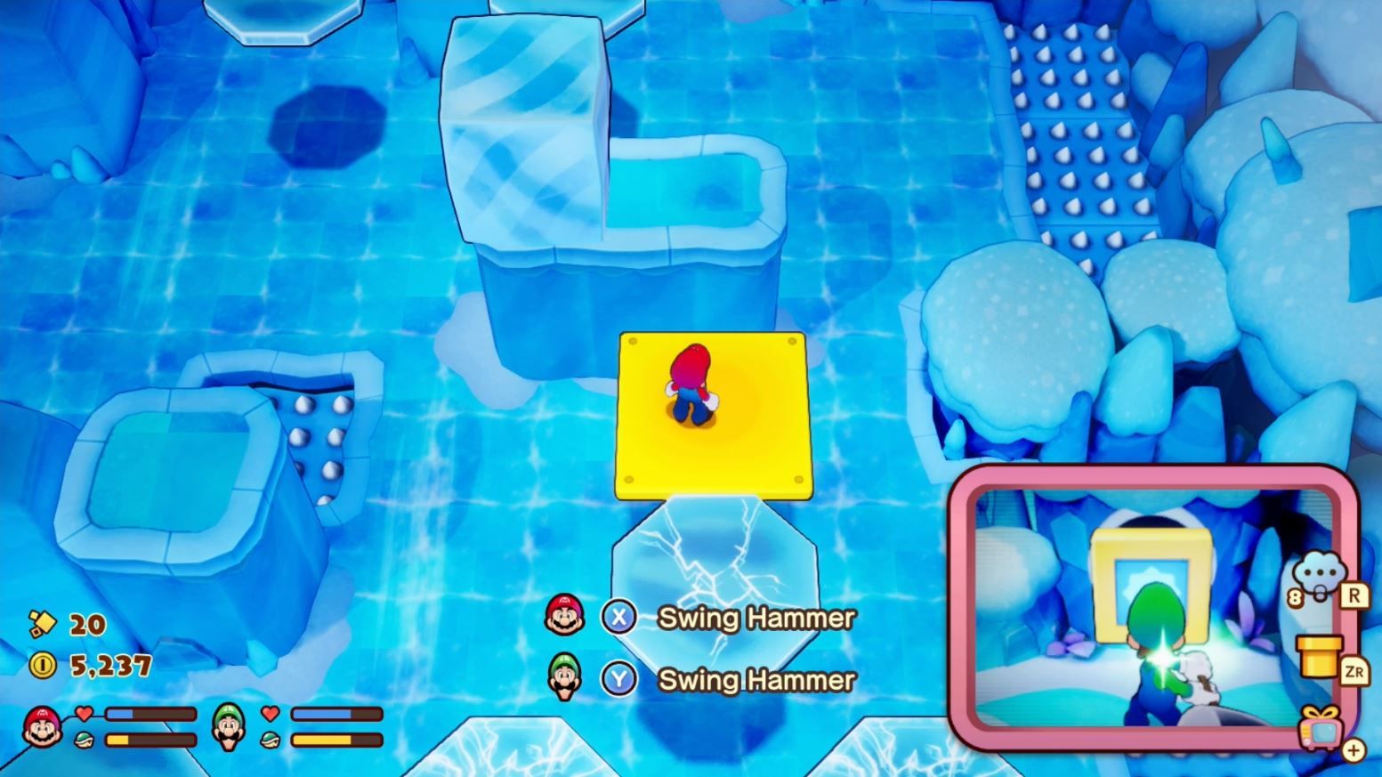 Mario standing on a yell platform in an icy room in Mario & Luigi: Brothership.