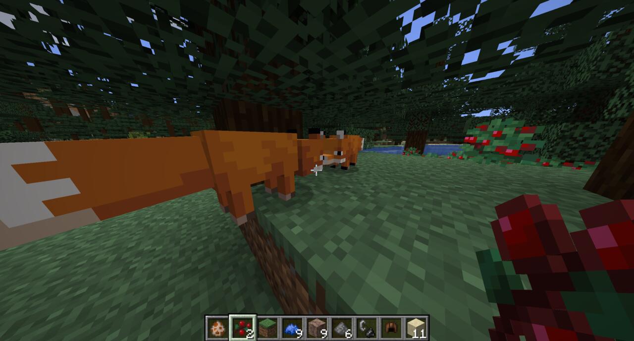 Two foxes breeding in Minecraft